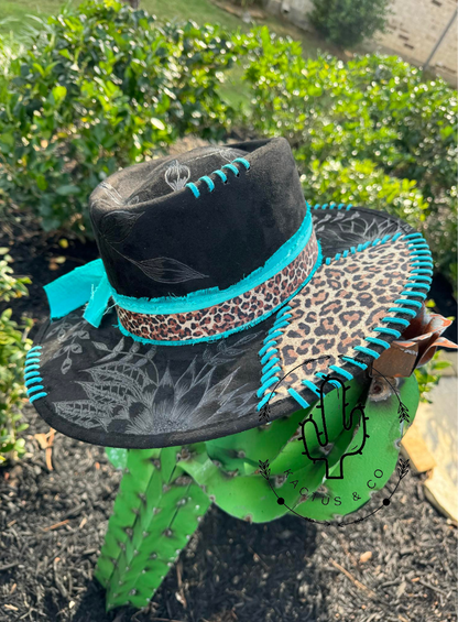 Black leopard with teal stitching Burned Hat